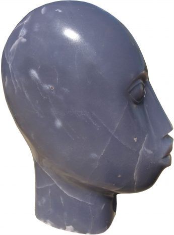 African Master sculptor Beautiful Head by artist Sylvester Mubayi in purple lepidolite stone